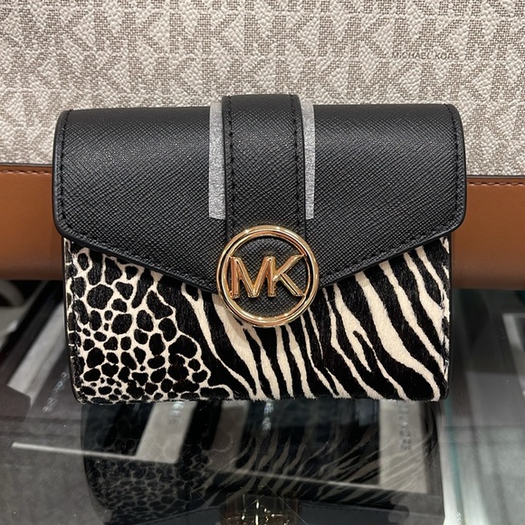 MICHAEL KORS
Carmen Medium Flap Bifold Faux Fur-Leather Wallet
Black
NWT - Picture 8 of 16